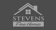 stevens fine homes background logo