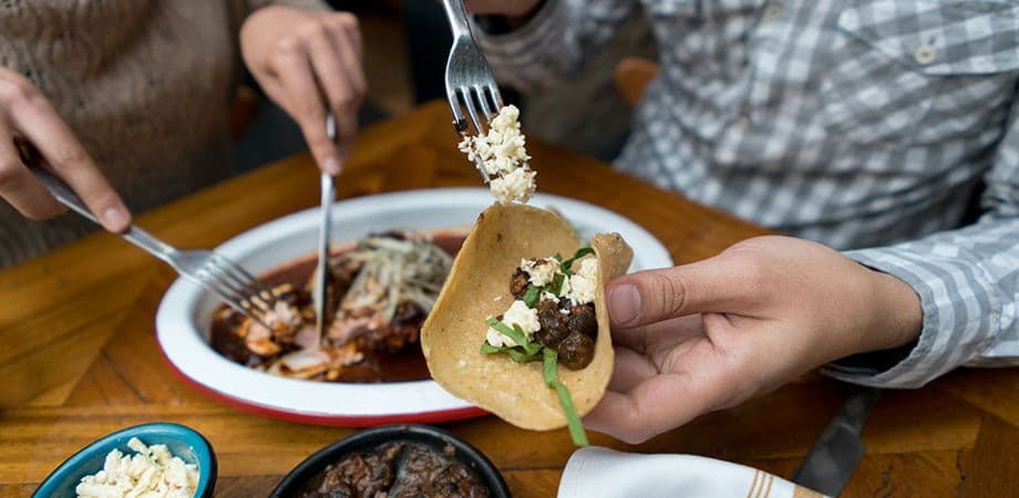 guy eating taco