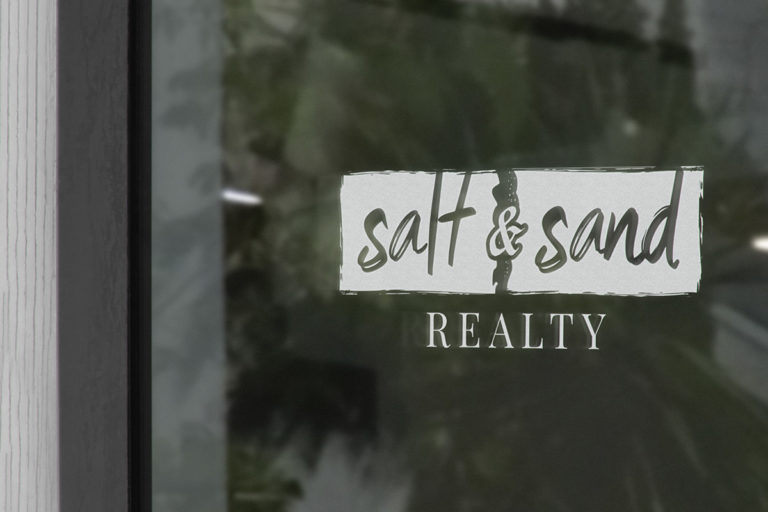 salt and sand realty logo on door