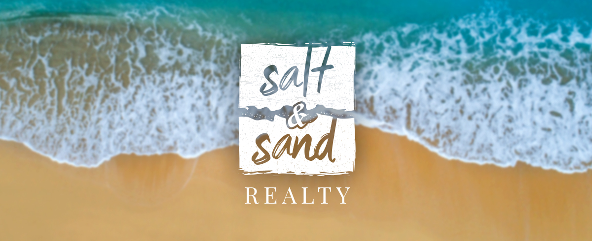 salt and sand realty logo over beach
